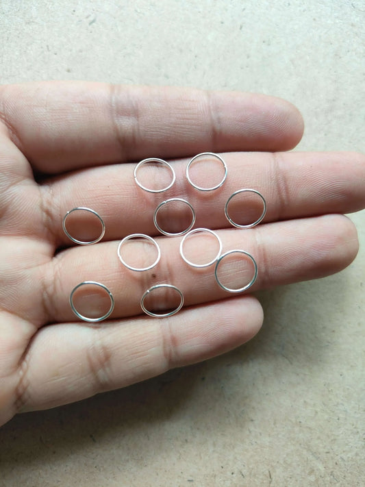 10mm-silver-connector-rings-hand-holding-10-pieces