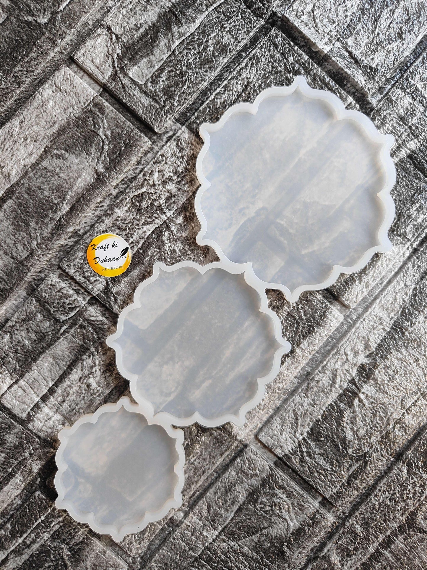 3D flower mould set with three scalloped circular silicone pieces in translucent white