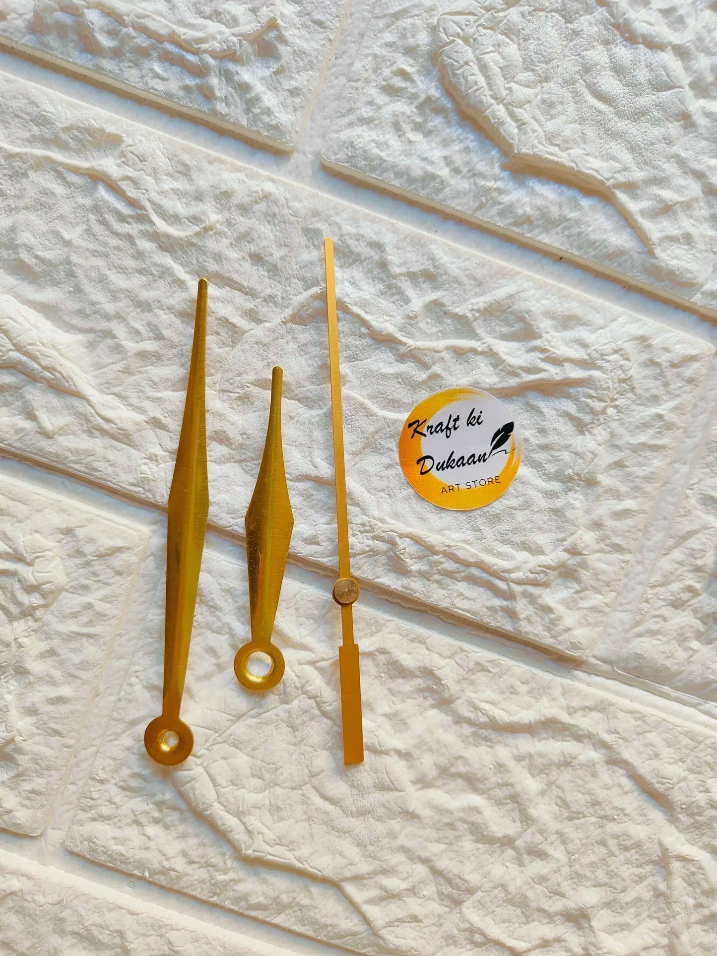 Metal clock hands A12 in gold: minute and hour hands with round hub