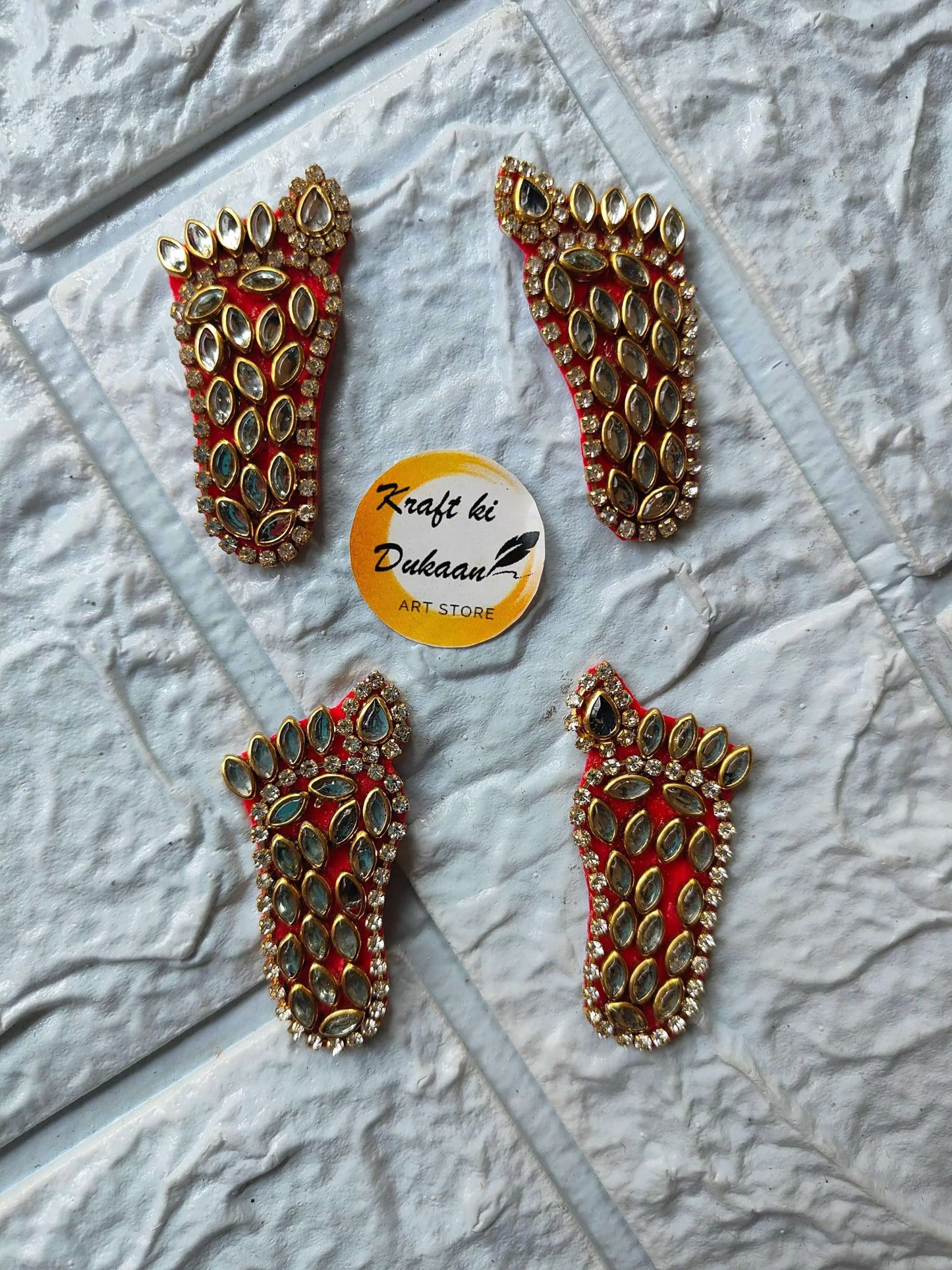 Kundan diamond charan earrings set: two pairs with gold-tone marquise kundan detailing