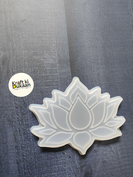 White lotus flower coaster mould with raised rim and layered petal design