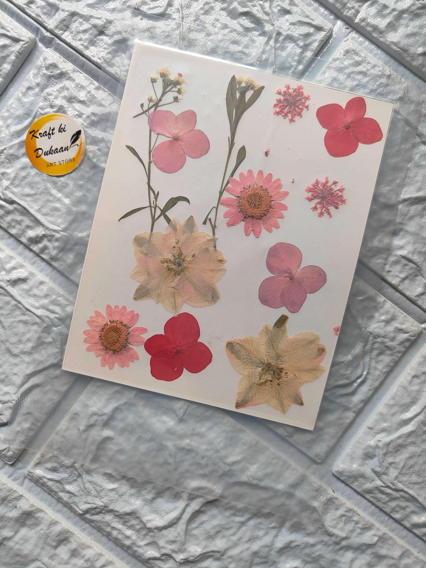 Pressed Flower Sheet Mix A14 with assorted pink and red flower designs on white card