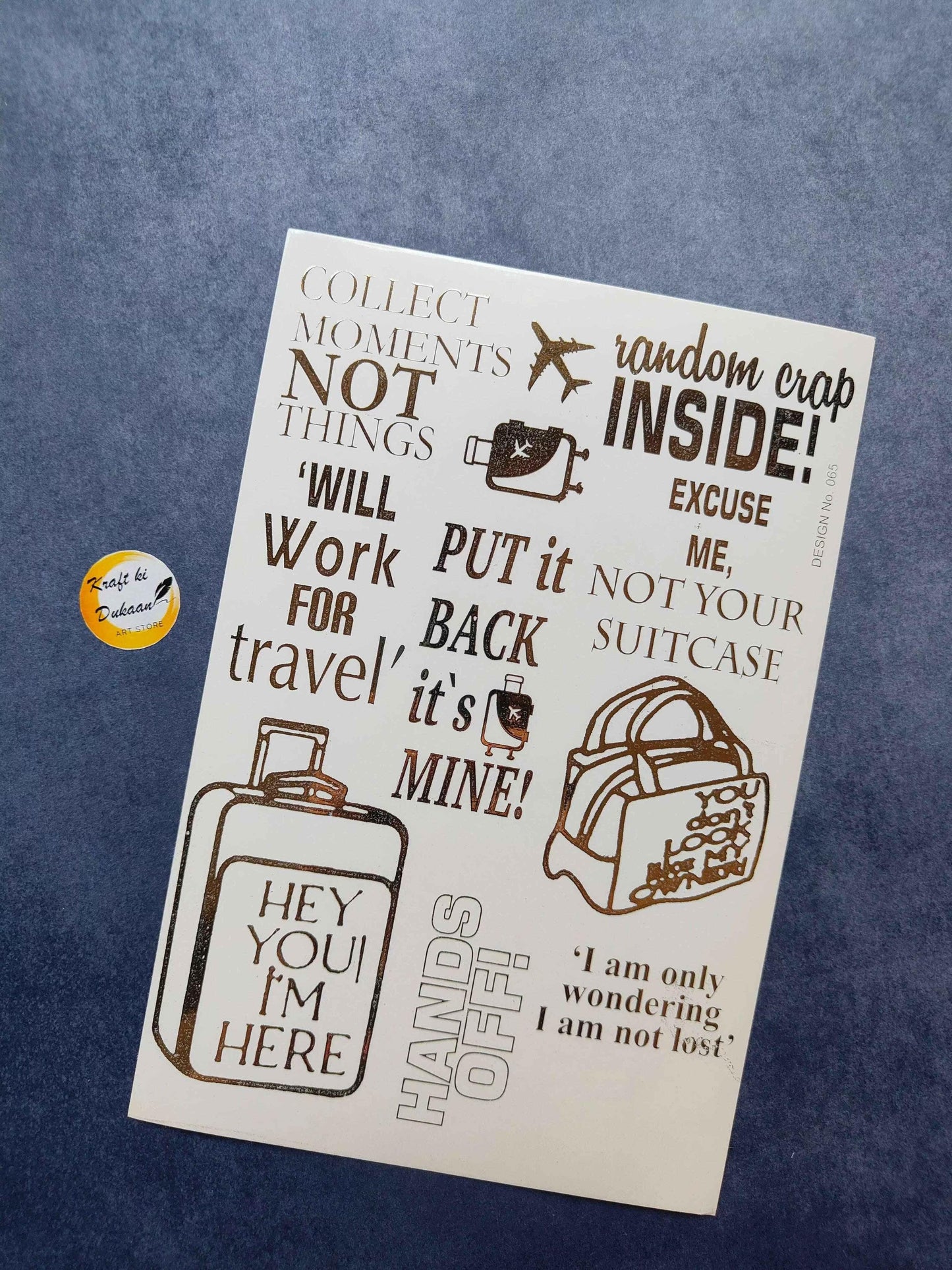 A5 gold-embossed sticker sheet with travel quotes and suitcase, hat, and bag icons