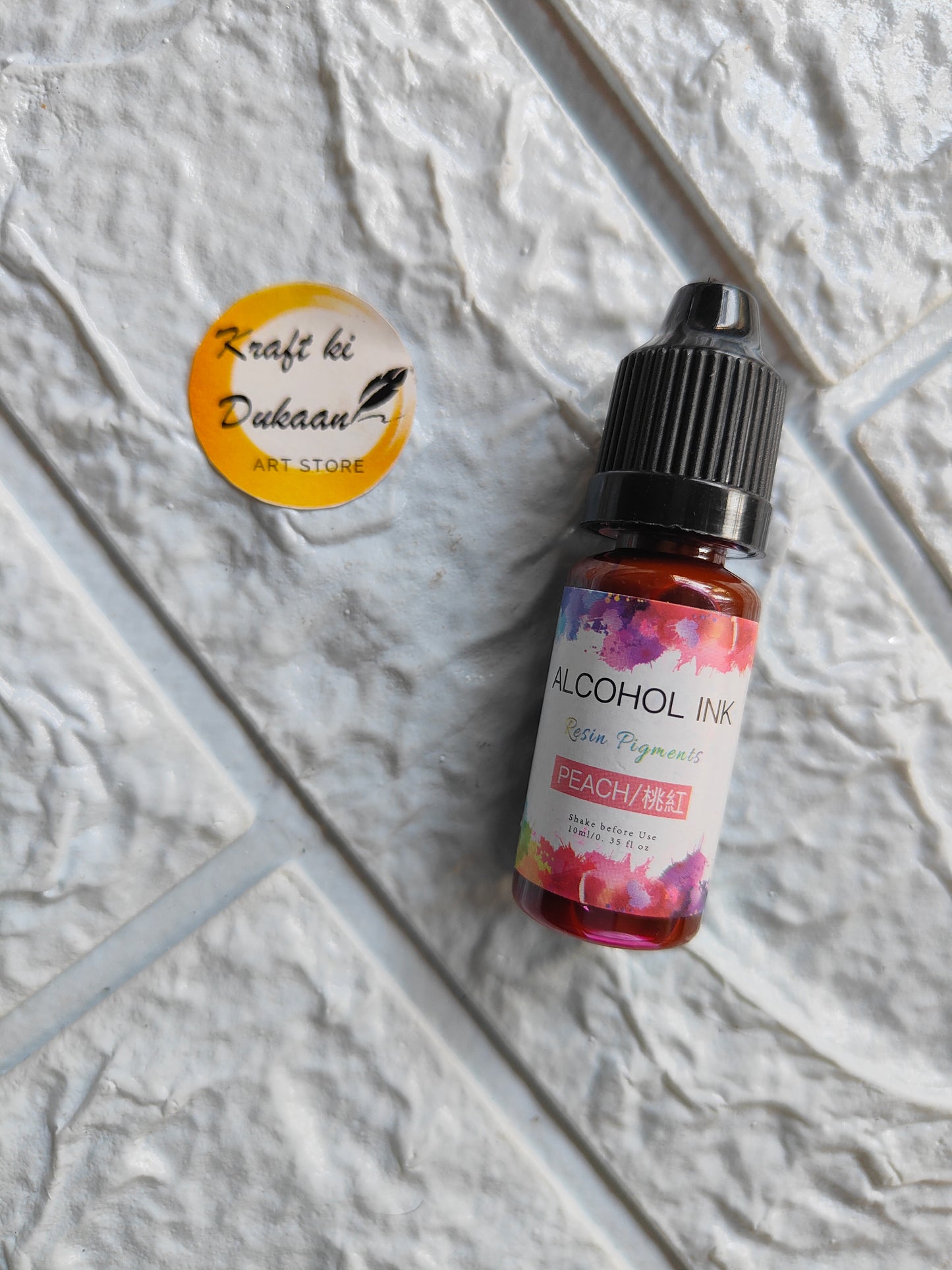 Peach alcohol ink for resin art in a 15ml bottle with vibrant pigments for creative projects