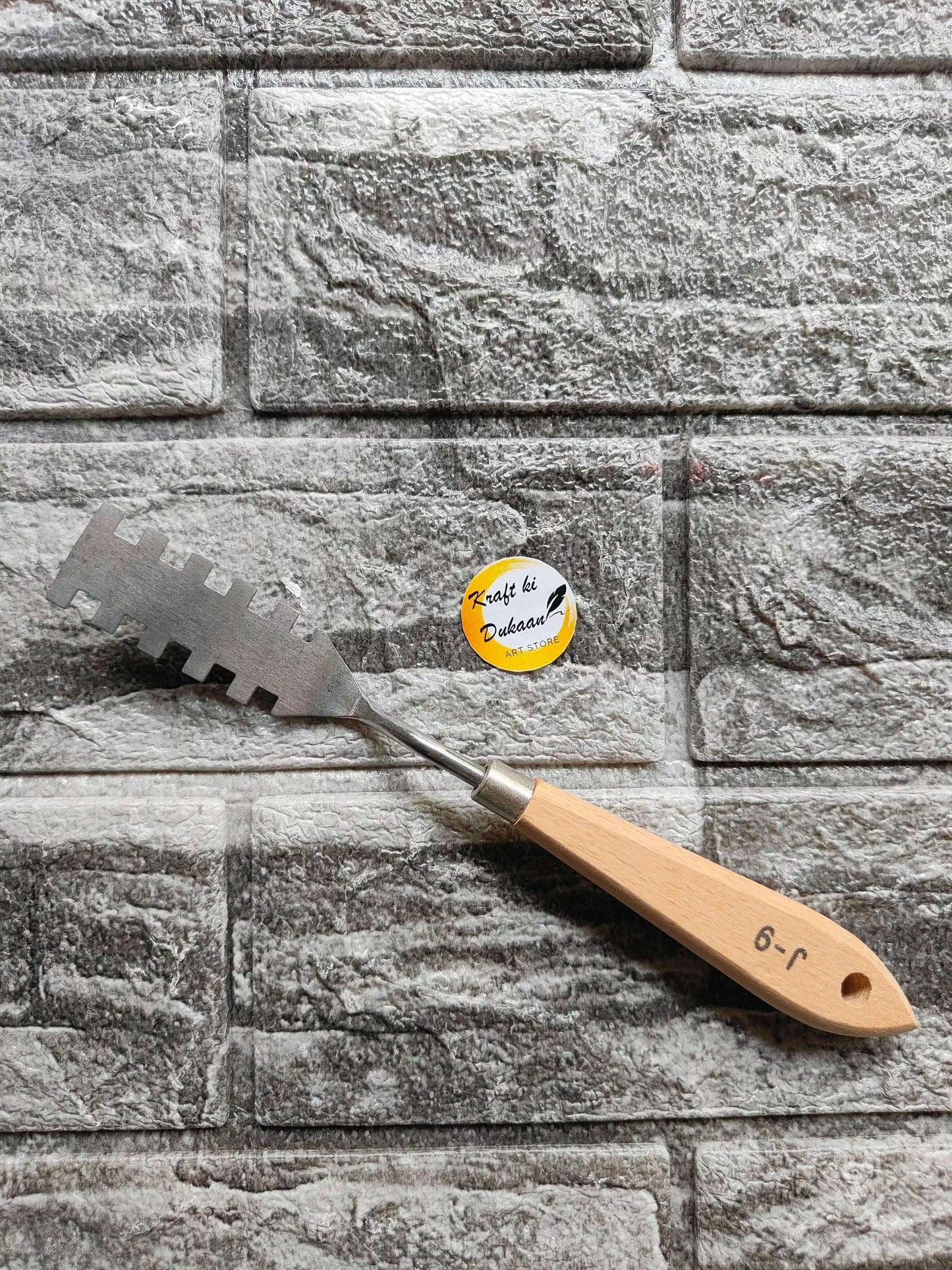 Painting knife A5 with wooden handle and broad metal blade, 6.1 cm marking