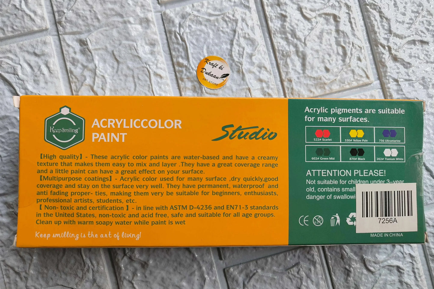 Acrylic color paint box back with product details and surface-use instructions