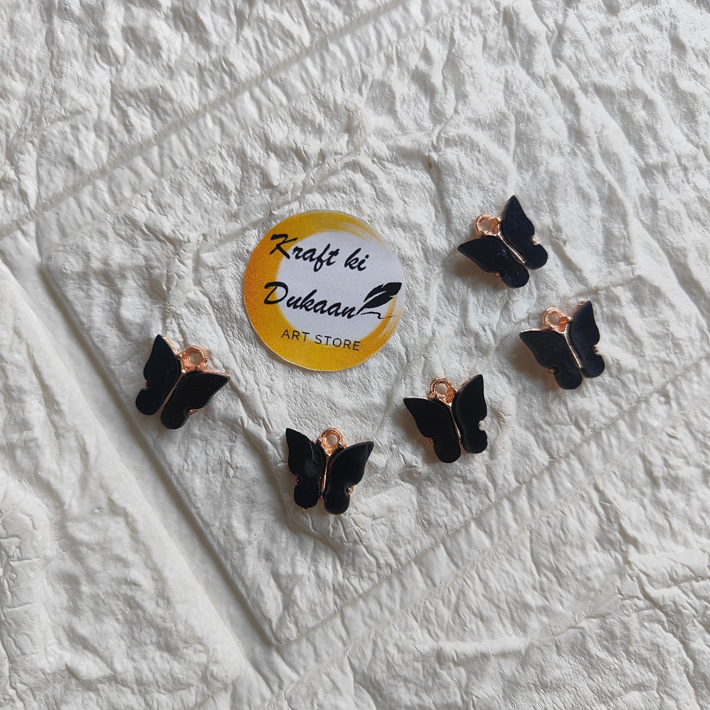 Set of butterfly resin pendant charms in black, ideal for jewelry making and crafts