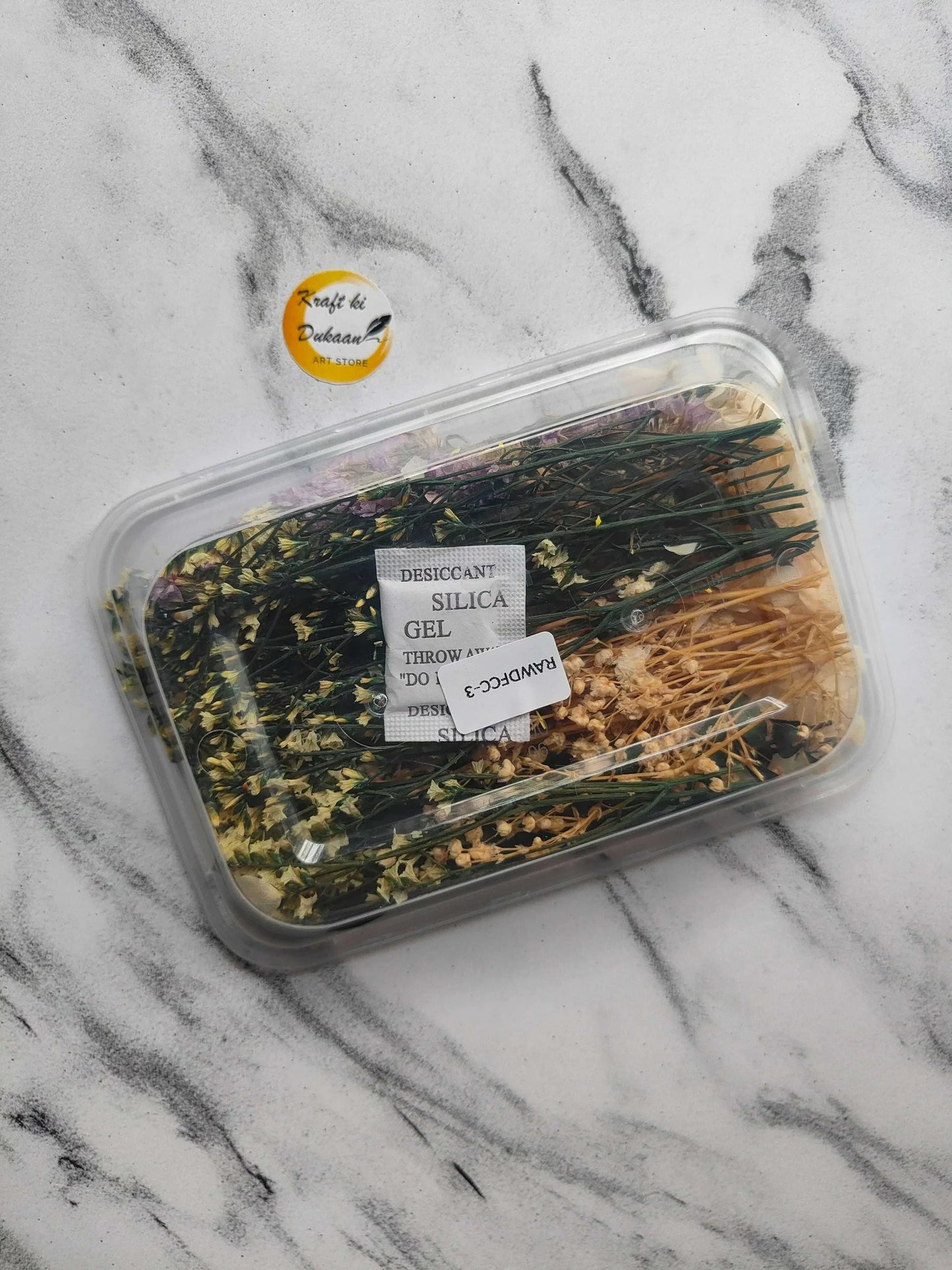Dry flower box E3 with silica gel packet and dried stems in clear tray