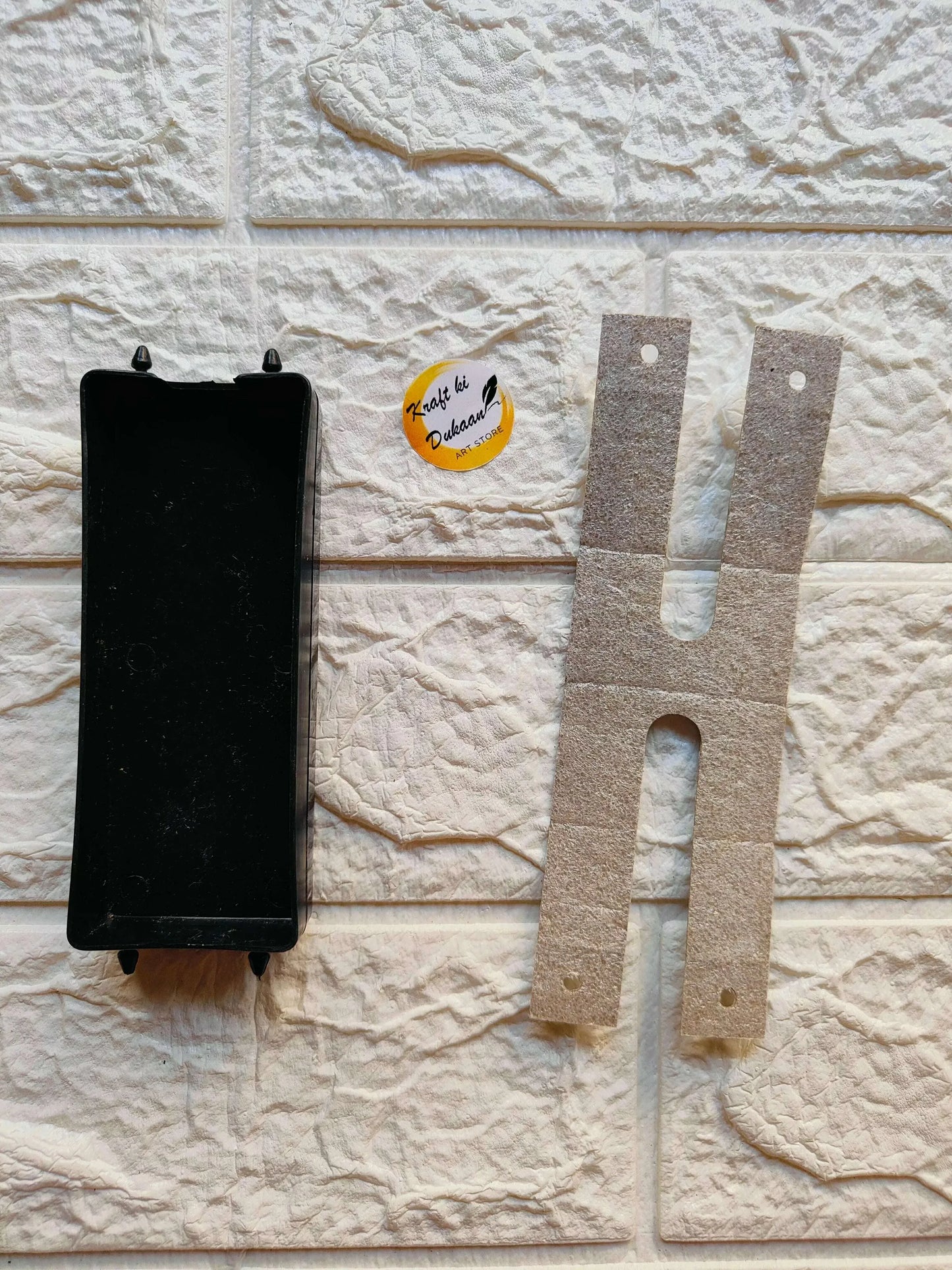 Black Clock Hands safety cover on left; two beige fabric guard strips with cutouts on right