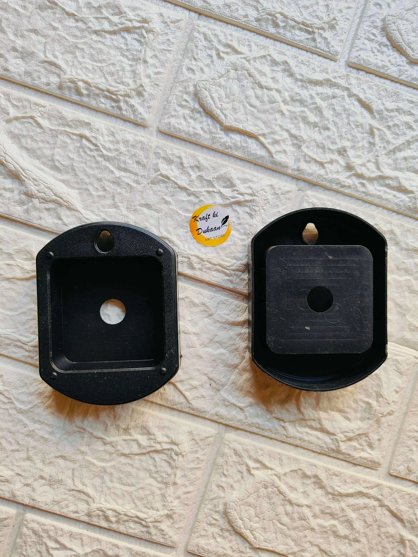 Black clock machine hanging cover with rectangular openings and hanging hook