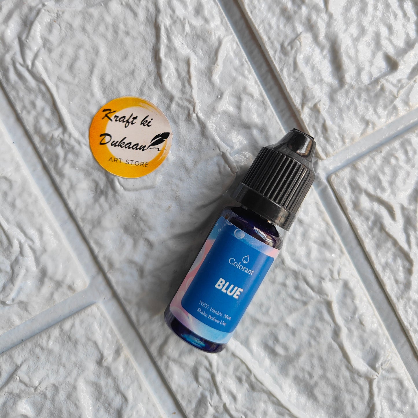Colorant bottle of blue resin pigment colorant for vibrant art projects from Kraft ki Dukaan