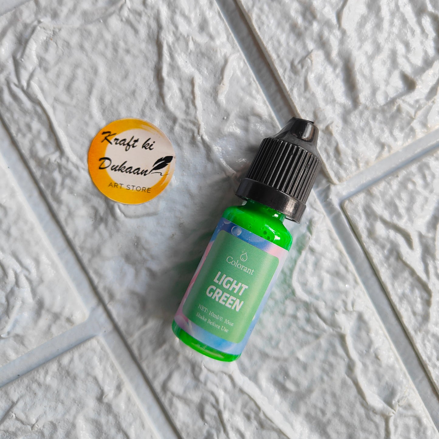Light green resin pigment colorant bottle ideal for vibrant crafting and art projects