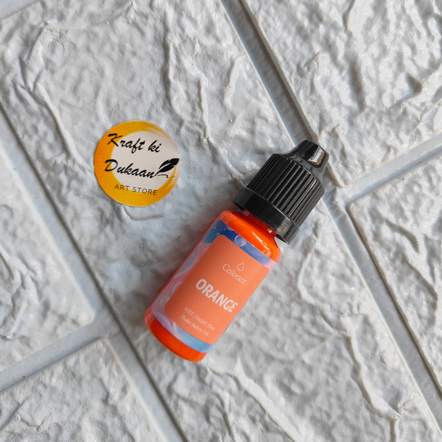Orange Resin Pigment Colorant by Kraft ki Dukaan in a 30ml bottle for crafts and DIY projects