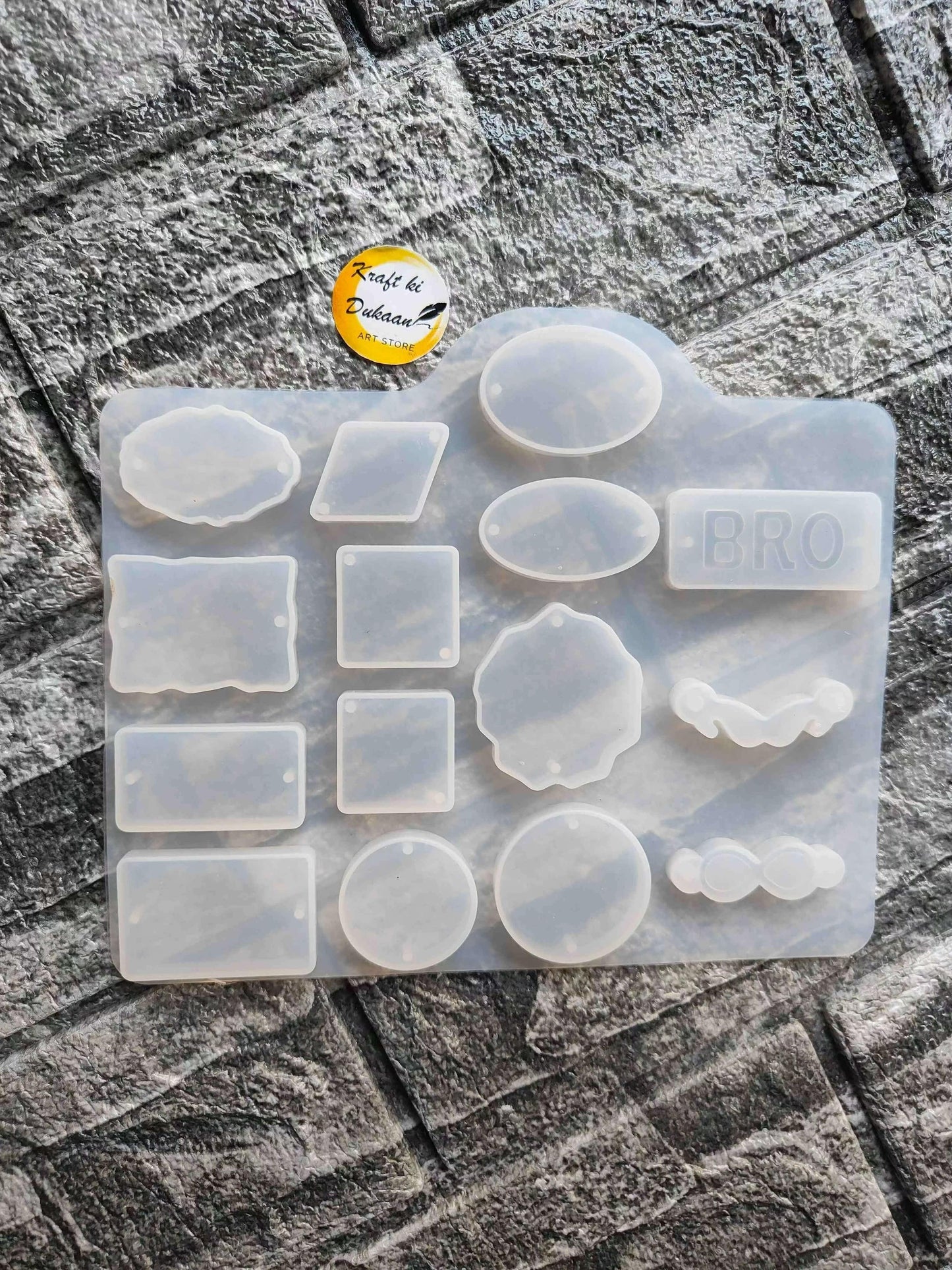 15-cavity rakhi mould with circle, square, flower cavities and a 'PRO' cavity