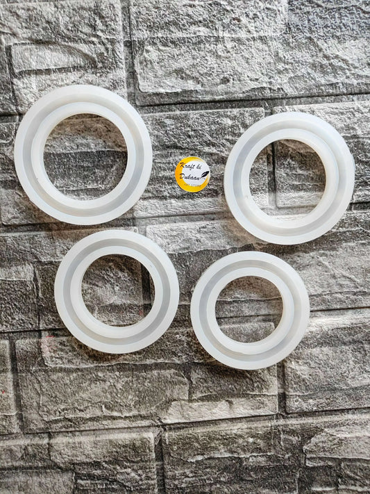 Four white 10mm round bangles with smooth glossy finish