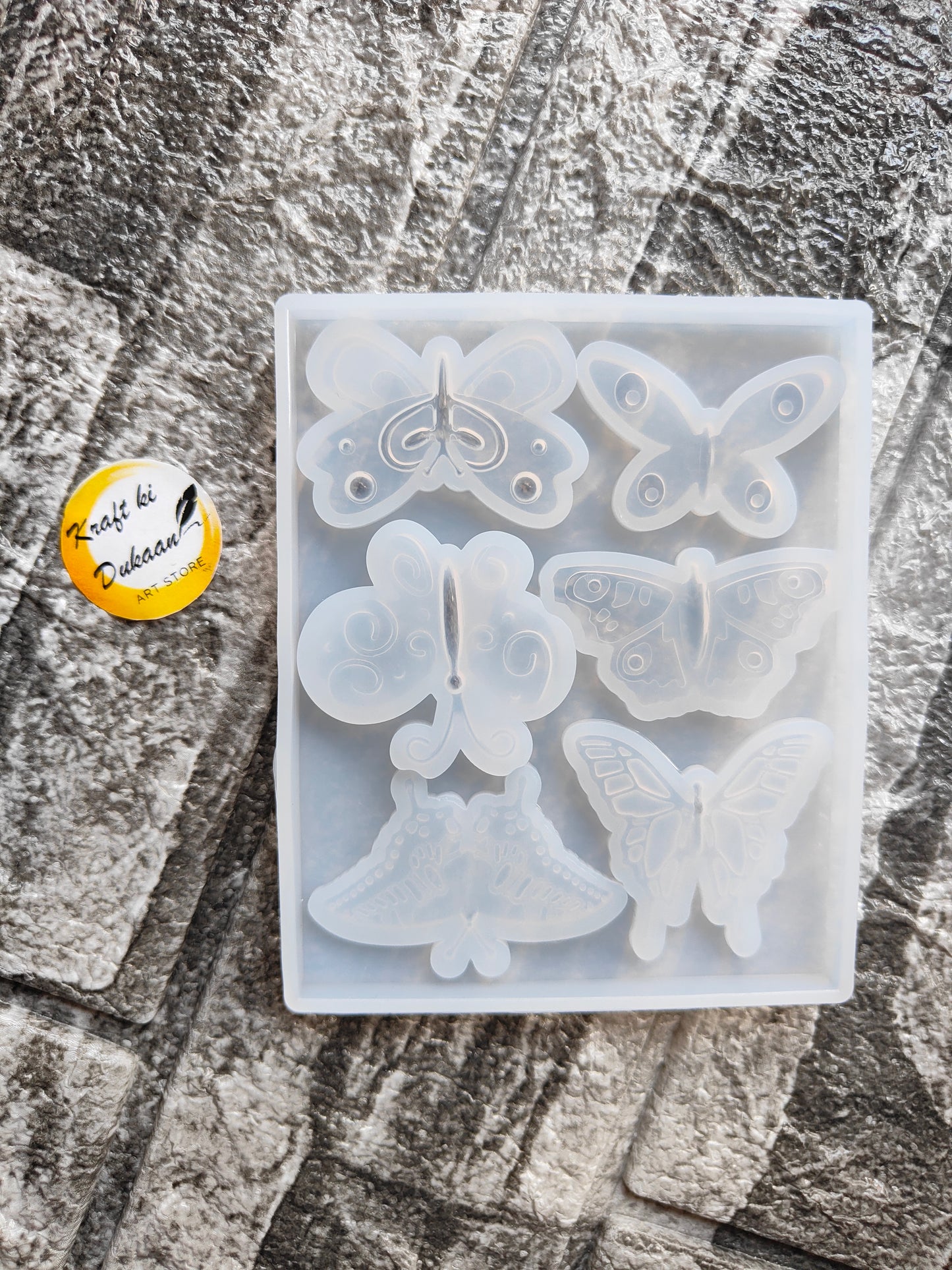 Butterfly resin mold with six butterfly-shaped cavities for crafting and DIY projects by Kraft ki Dukaan