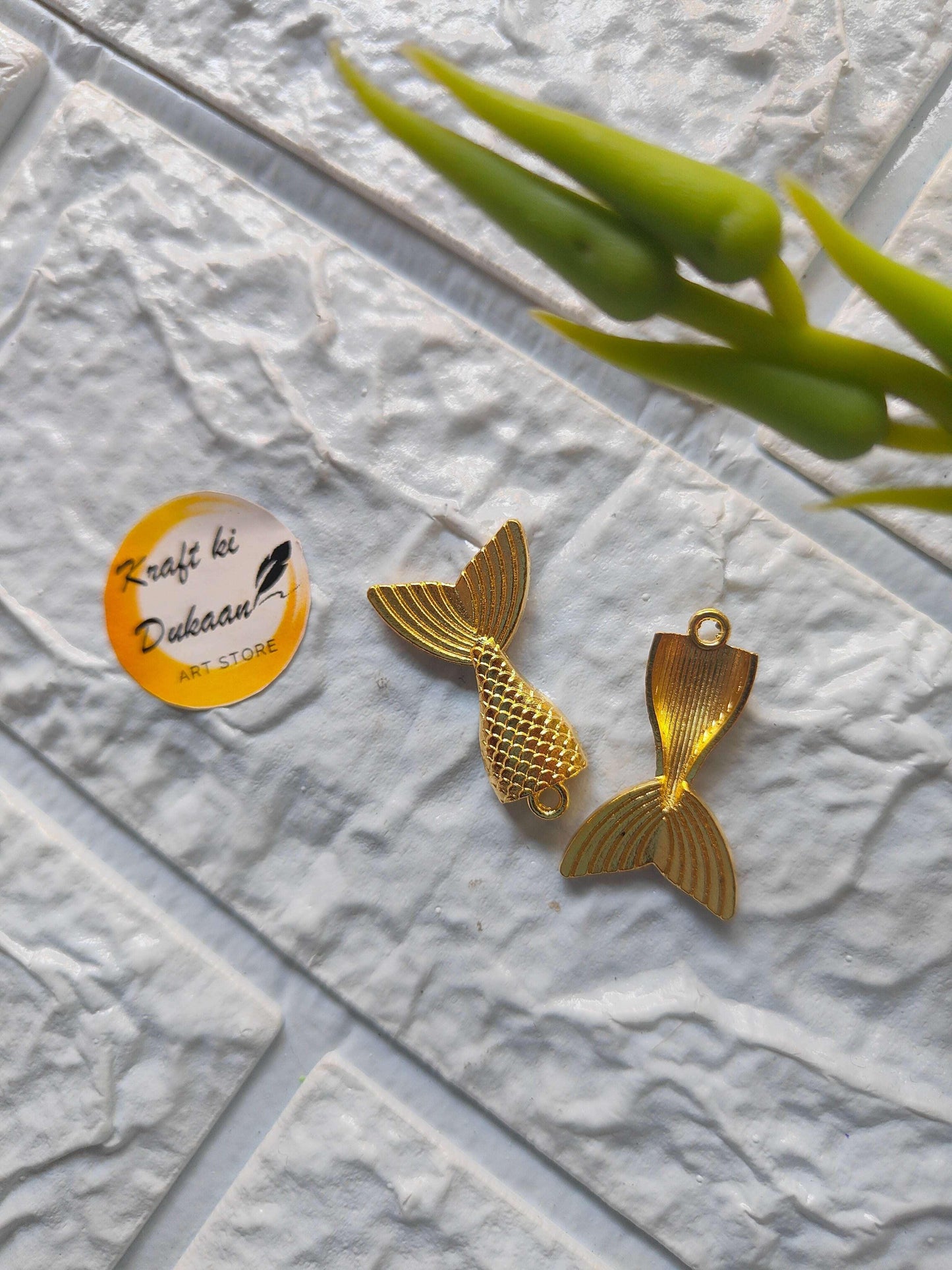 Fish tail metal charms, gold tone, 2 fish-shaped pendants with loops