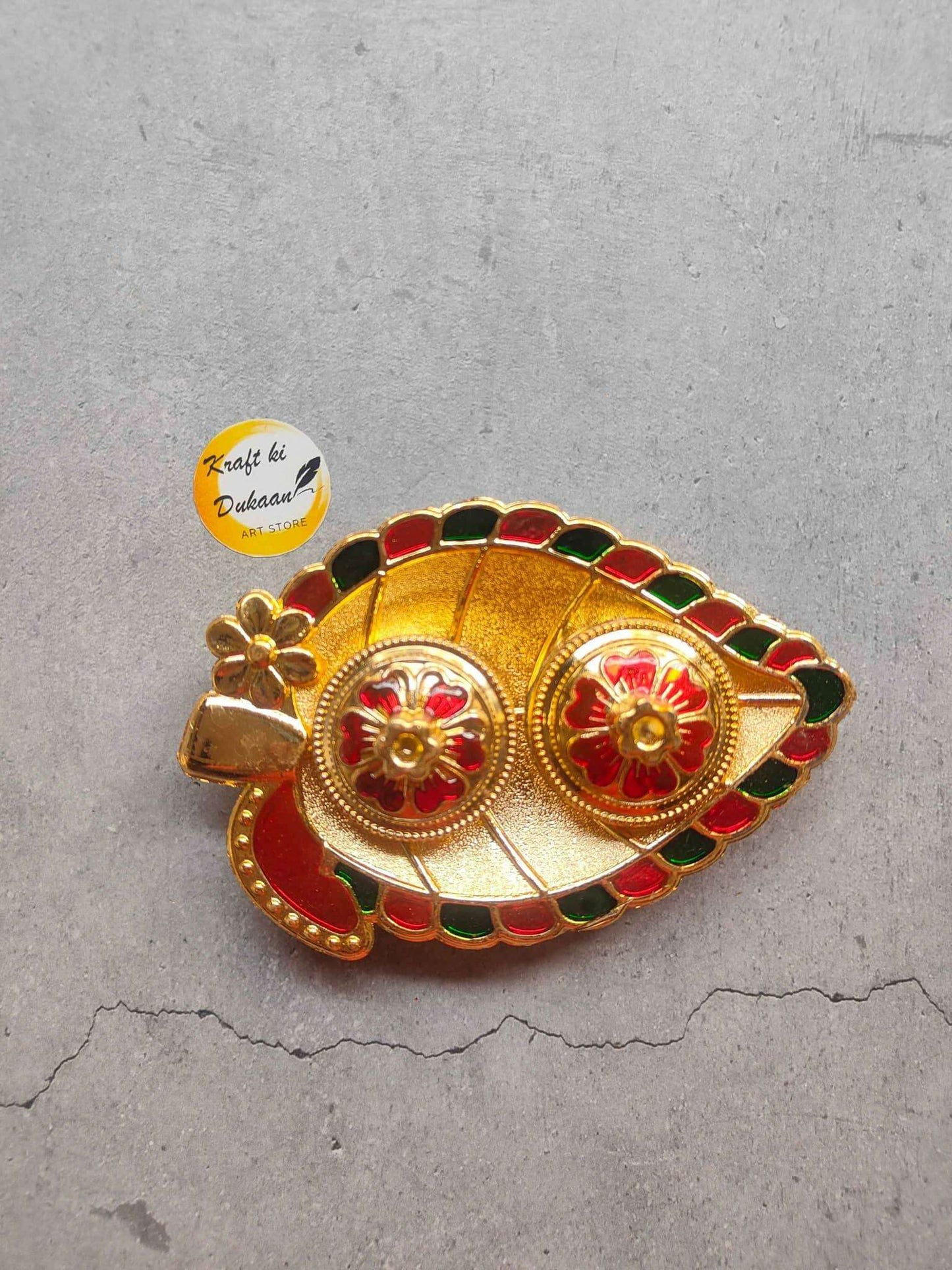 Roli Chawal Plate A6: gold-toned tray with red-green border and twin floral motifs