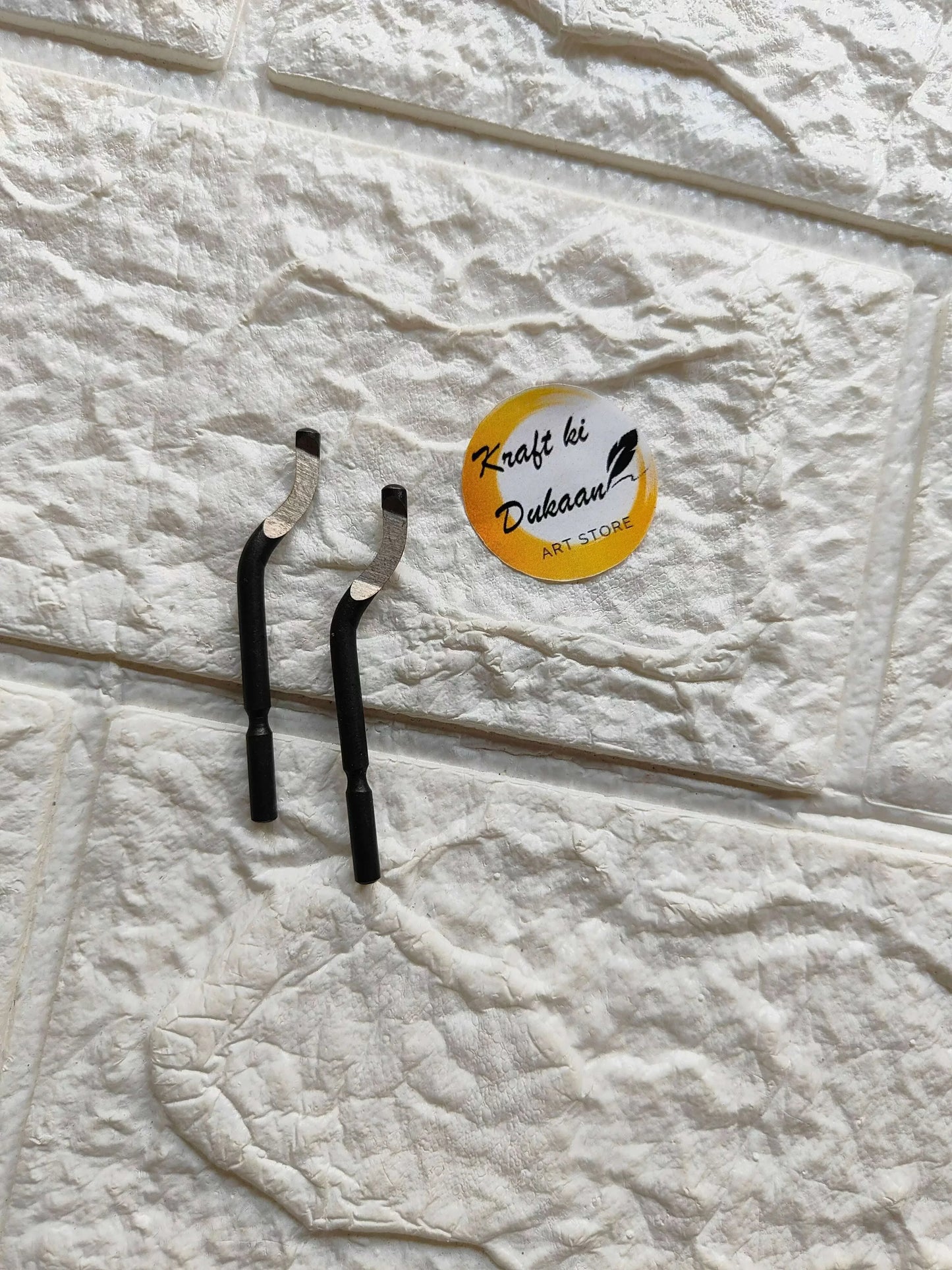 Deburring tool blade pair with curved black handles