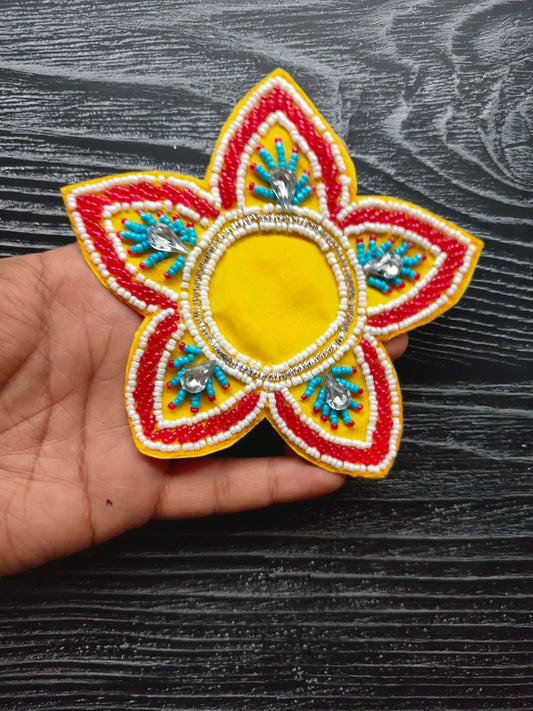 Decorative patch, yellow center flower with red/white petals and blue bead embroidery