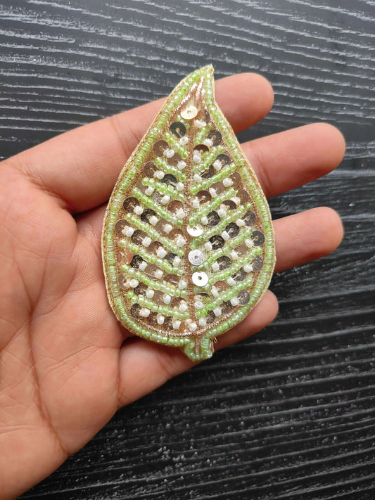 Green teardrop sequin patch with sparkly beads, scalloped edges