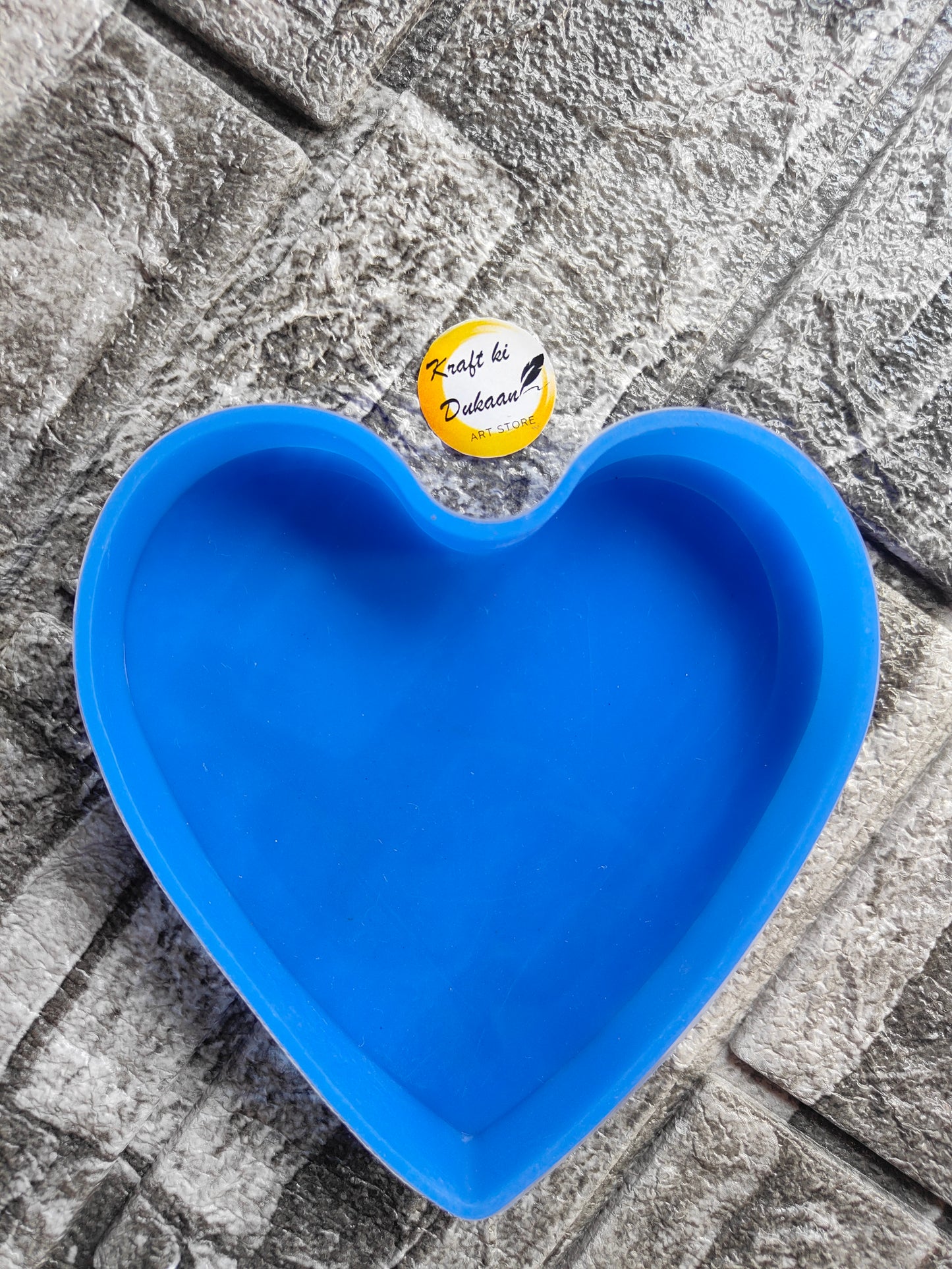 Blue silicone deep heart mold for resin crafting, perfect for making heart-shaped items