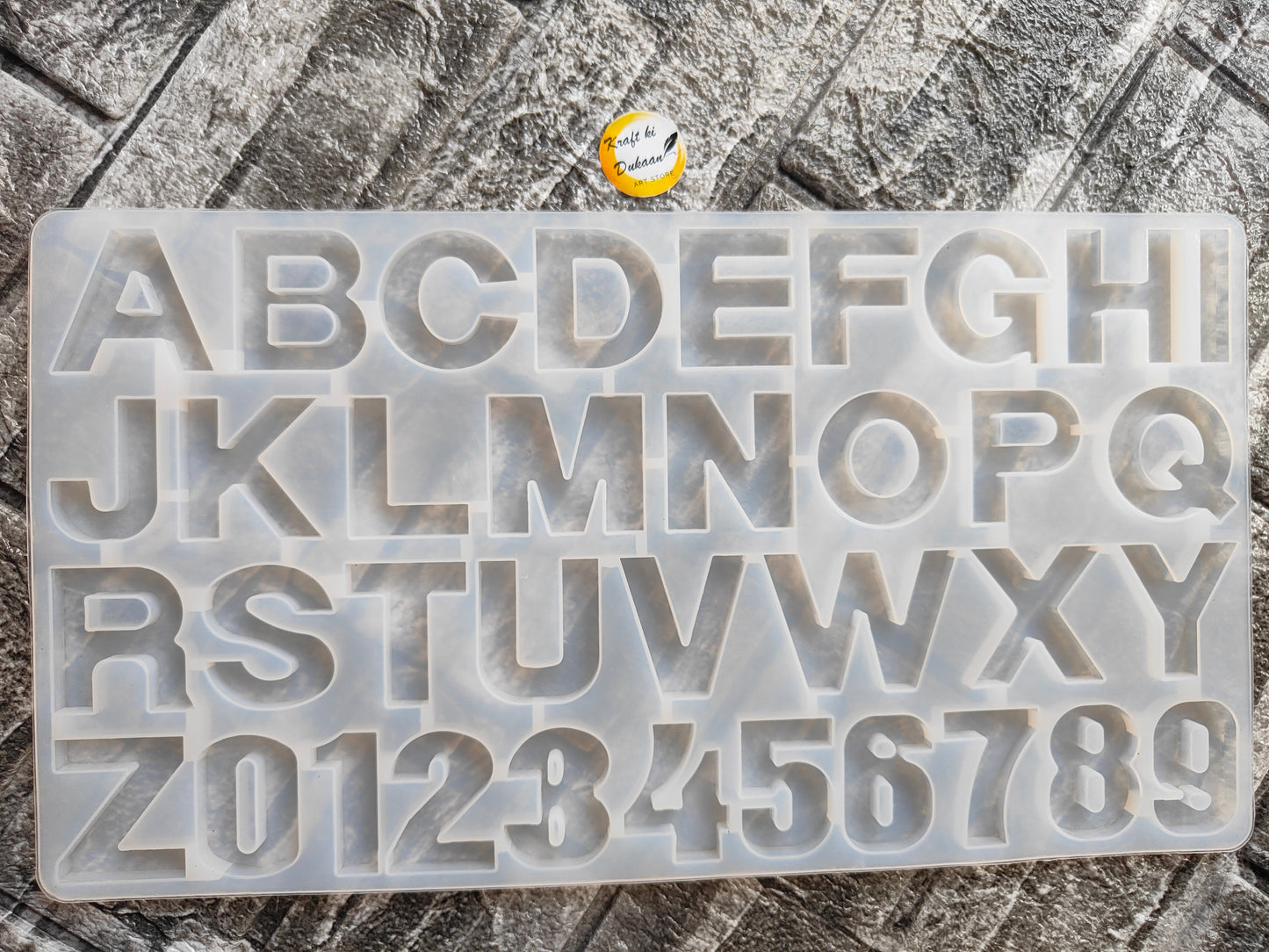 Kraft ki Dukaan DIY letter casting mold with uppercase alphabet and numbers on clear silicone tray