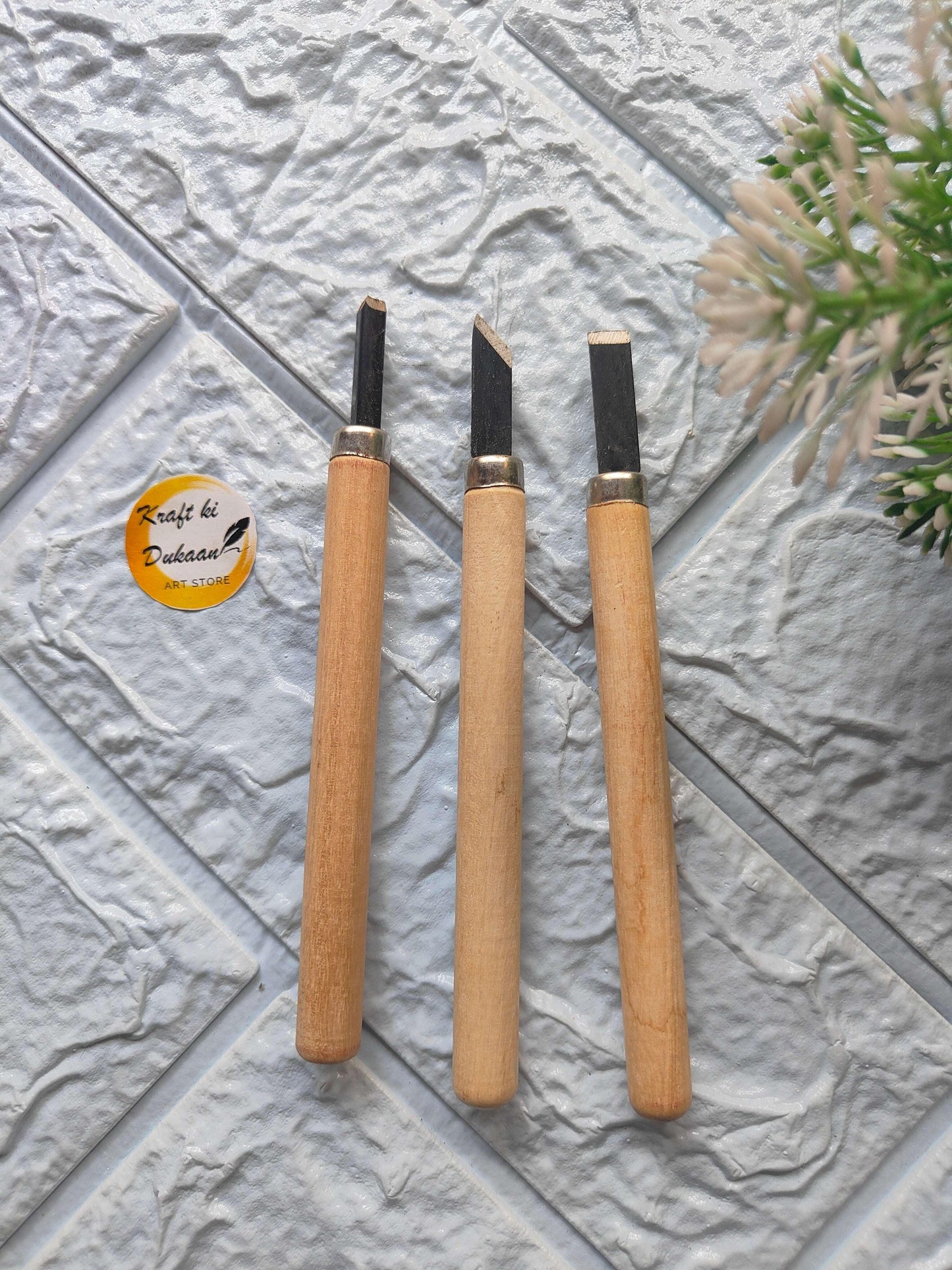 DIY wood carving chisel set with three wooden-handled chisels