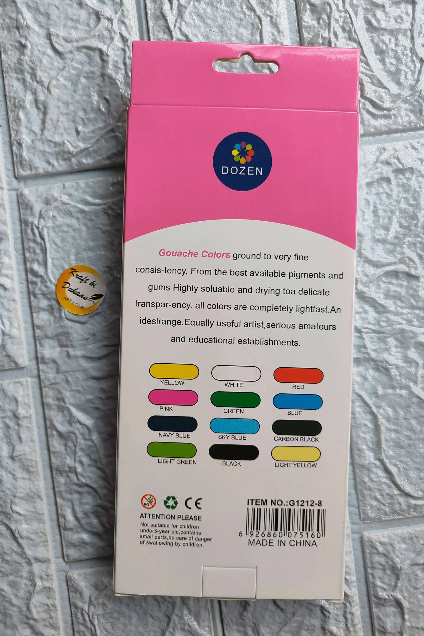 Back of gouache colour box with color list: yellow, white, red, pink, green, blue, black