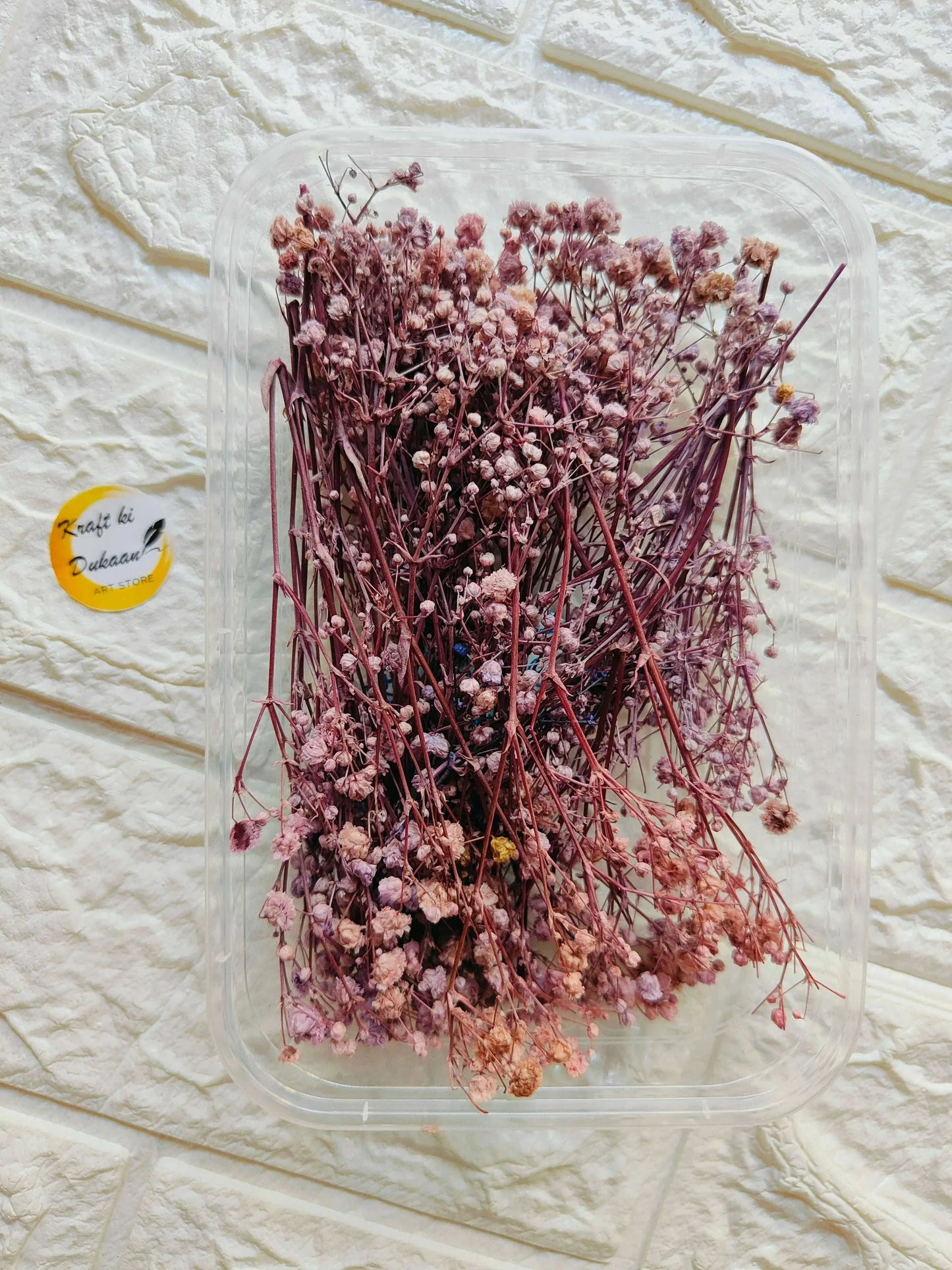 Dry Flower Box D2 with dense dried pink-purple blossoms in a clear square box