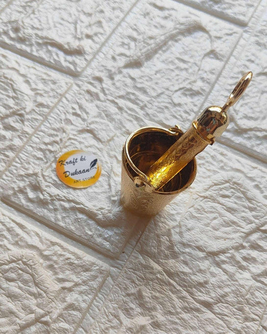 Golden Bucket with Pichkari Set A1—round gold bucket with pichkari nozzle on top
