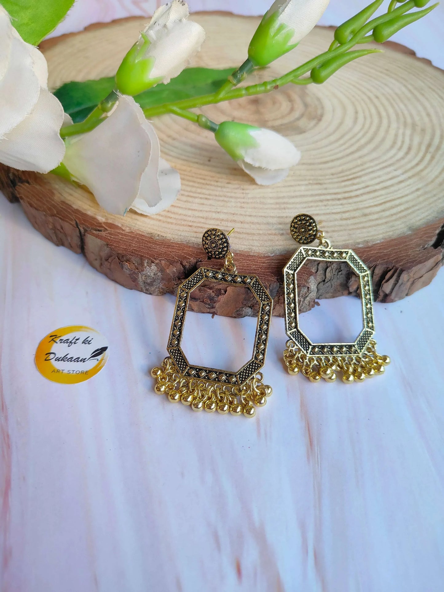 Golden Jhumka D6: gold-toned hexagon jhumka earrings with filigree border, no beads