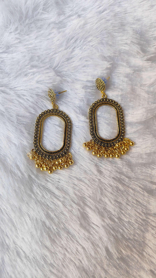 Golden jhumka drop earrings, oval center, textured top stud, gold fringe (no beads)