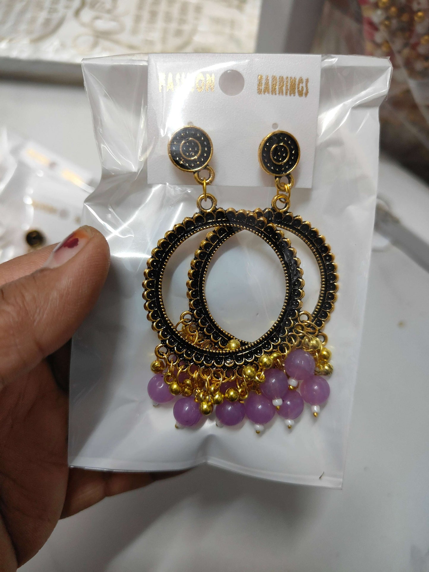 golden-jhumka-earrings-with-beads-purple-beads