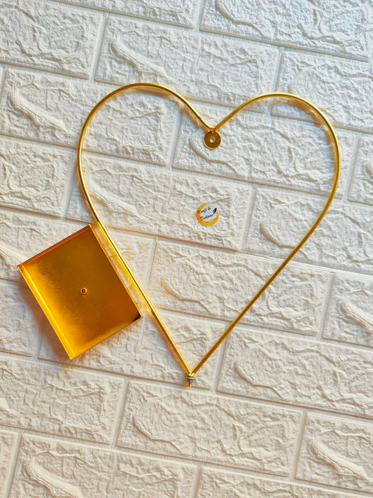 Golden heart-shaped metal stand with small hanging square tray frame