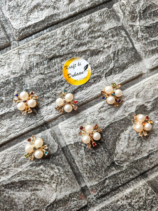 golden-pearl-flower-beads-pack-laying-on-surface
