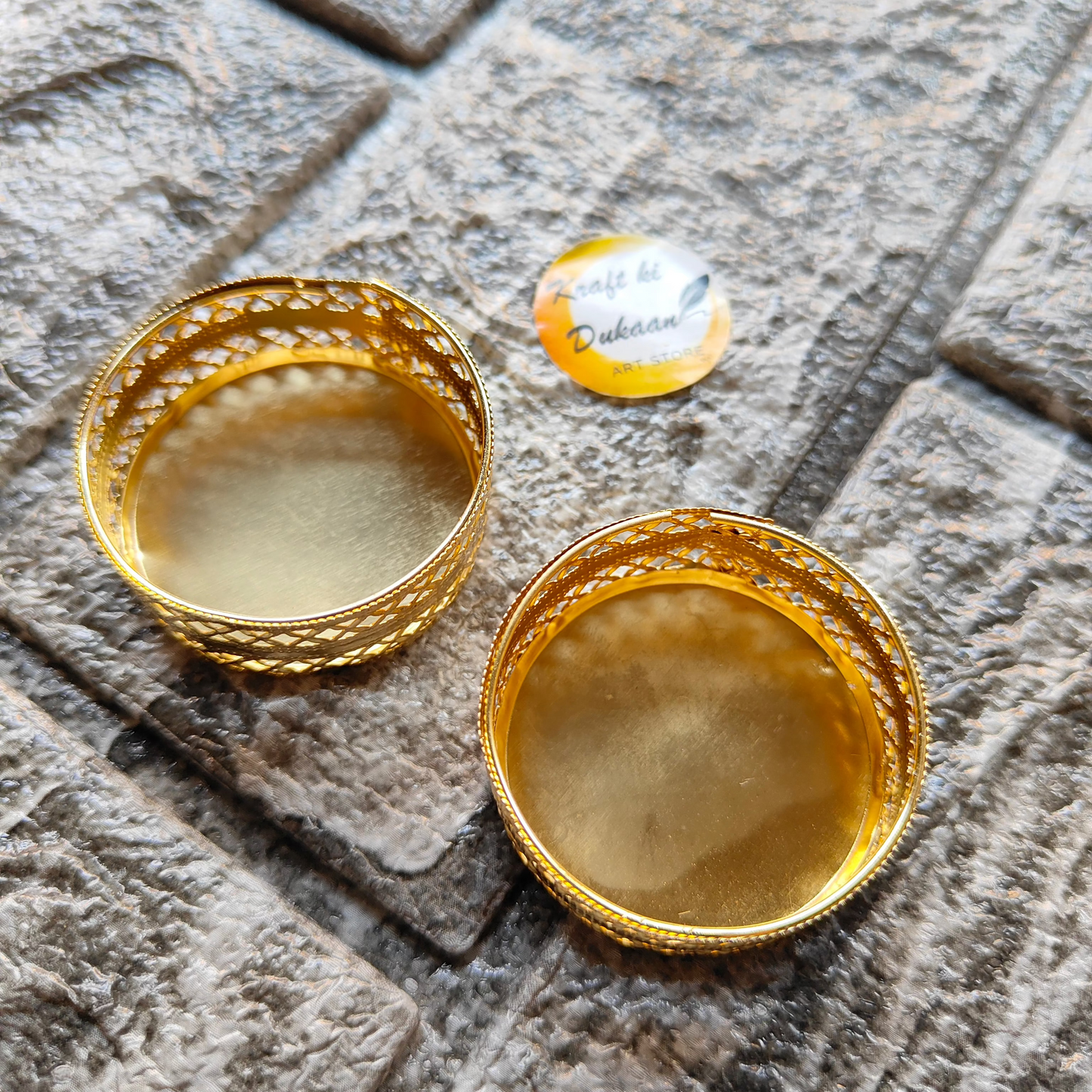 Elegant handcrafted tea light stand in gold with intricate design for home decor