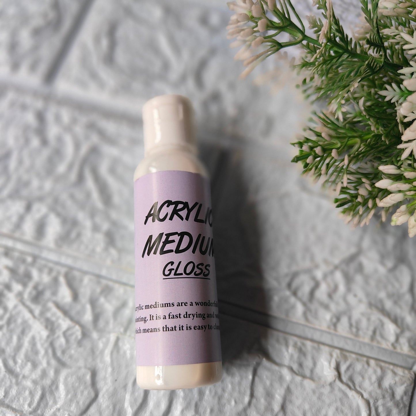 High Gloss Acrylic Medium bottle designed for artists to achieve a glossy finish in their paintings