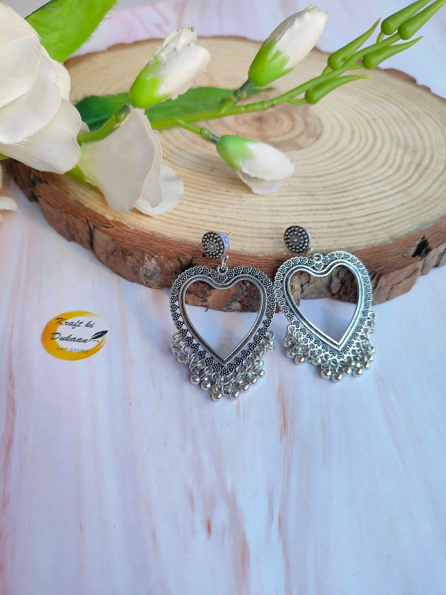 Heart jhumka earrings, silver-tone heart dangles with filigree edging