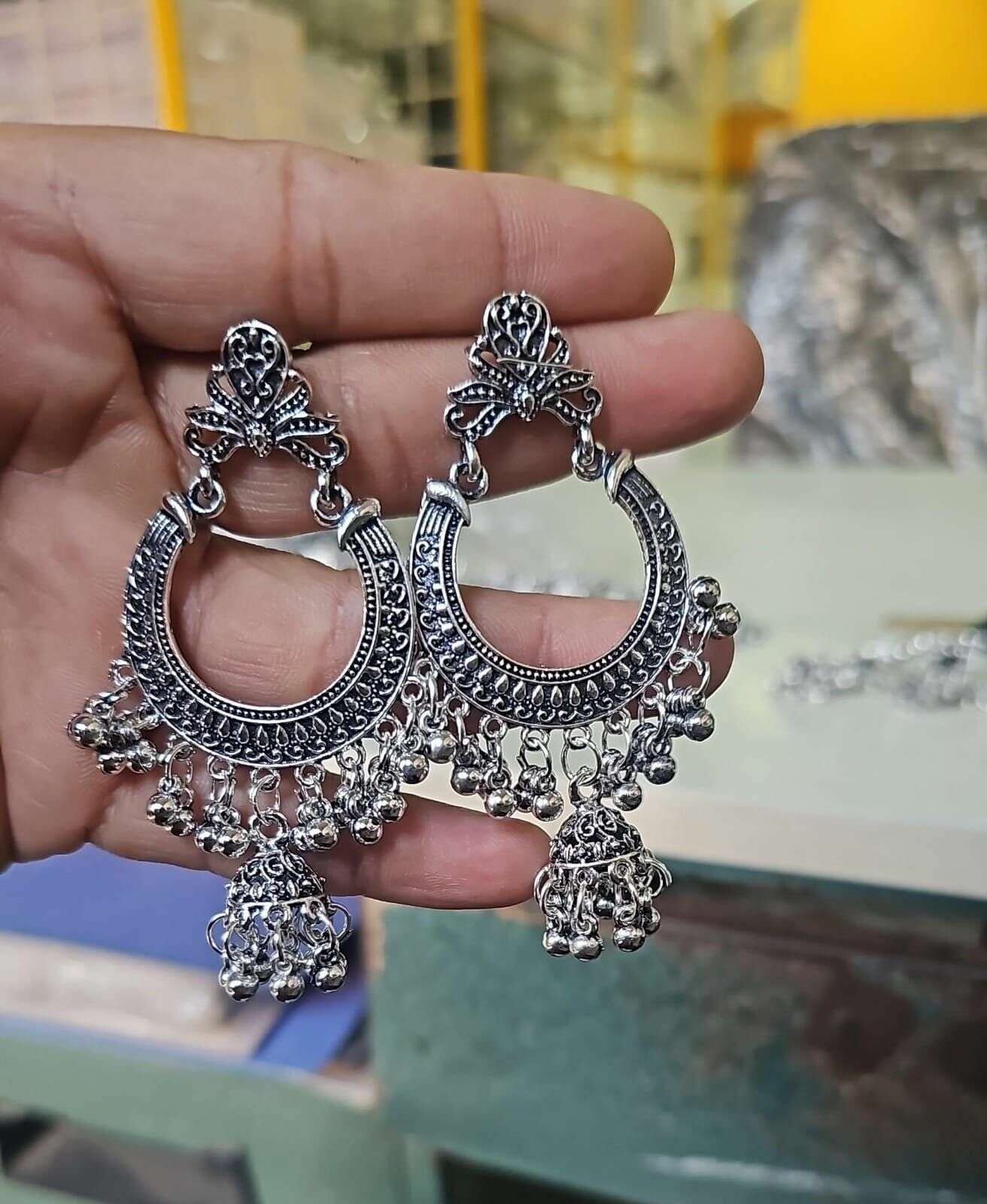 Kashmiri silver jhumka K1: ornate crescent hoop earrings with dangling bead tassels