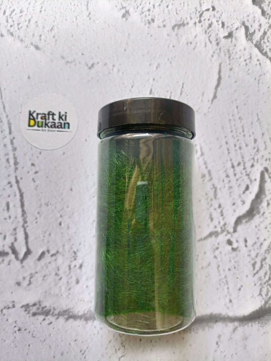 Artificial Grass 40GM dark green artificial grass fibers in a clear jar with black lid
