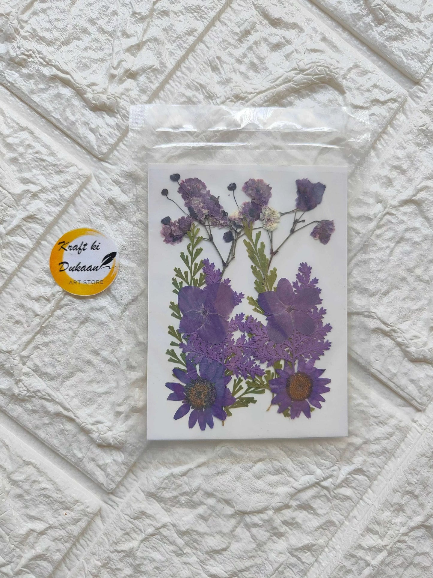 Pressed Flower Sheet Purple Mix with purple dried blooms on white