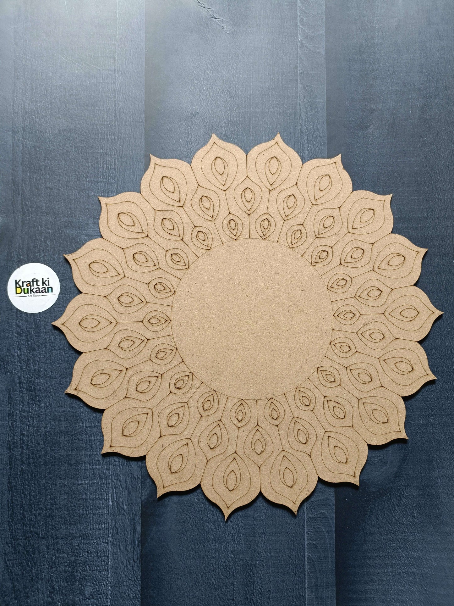 Engraved MDF A3 circular board with ornate radial eye motifs and unengraved center