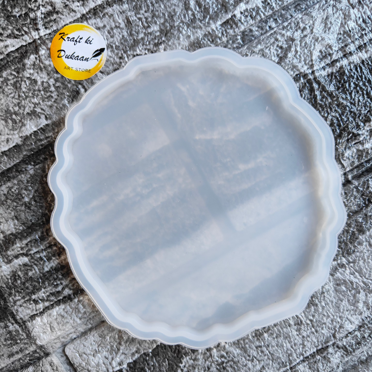 Kraft ki Dukaan agate round edge resin mould on textured stone surface for crafting