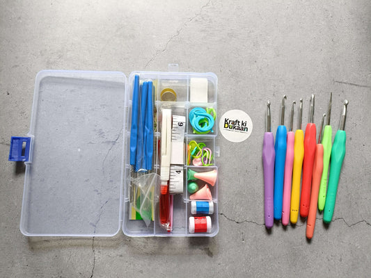 Open 52-piece crochet hook kit case with colorful hooks (purple, blue, red, green)