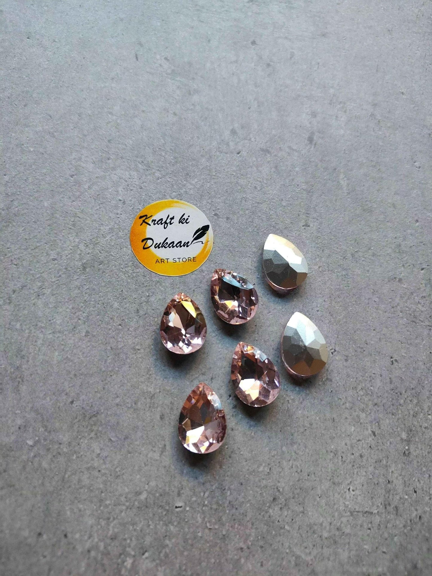 Drop-shaped diamond glass beads, light yellow faceted teardrops (pack of 20)