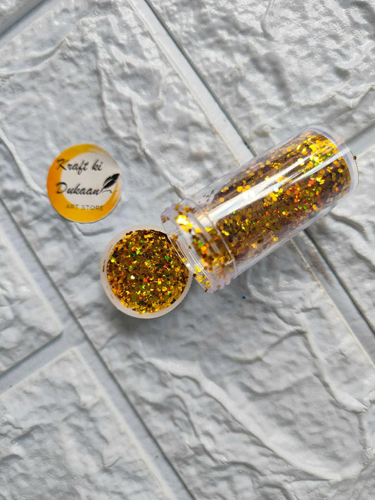 Glitter Chunks A gold glitter chunks in clear tube