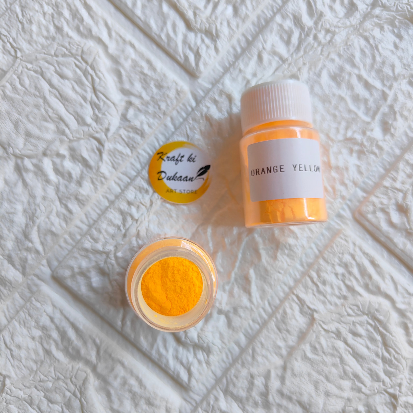 Kraft ki Dukaan Glow Mica Powder in Orange Yellow for resin crafting and art projects
