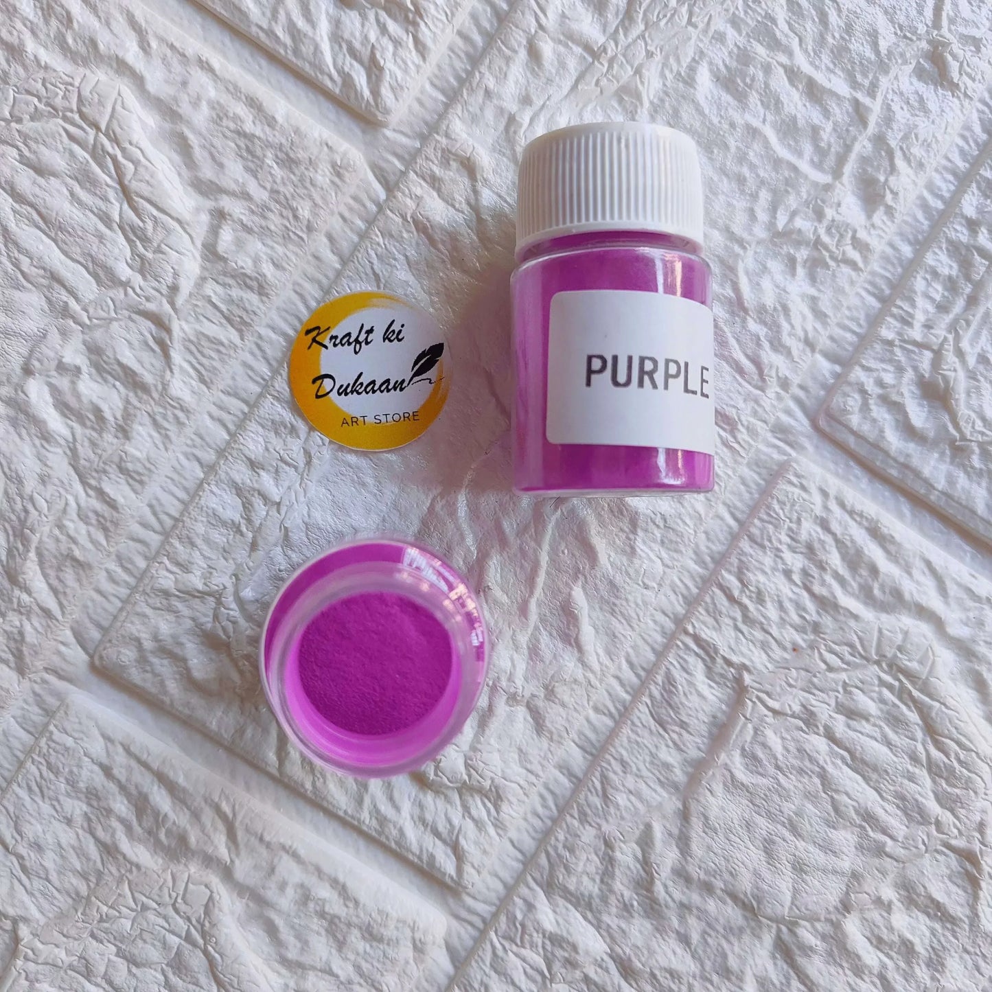 Purple glow mica powder jar with purple powder in open pot