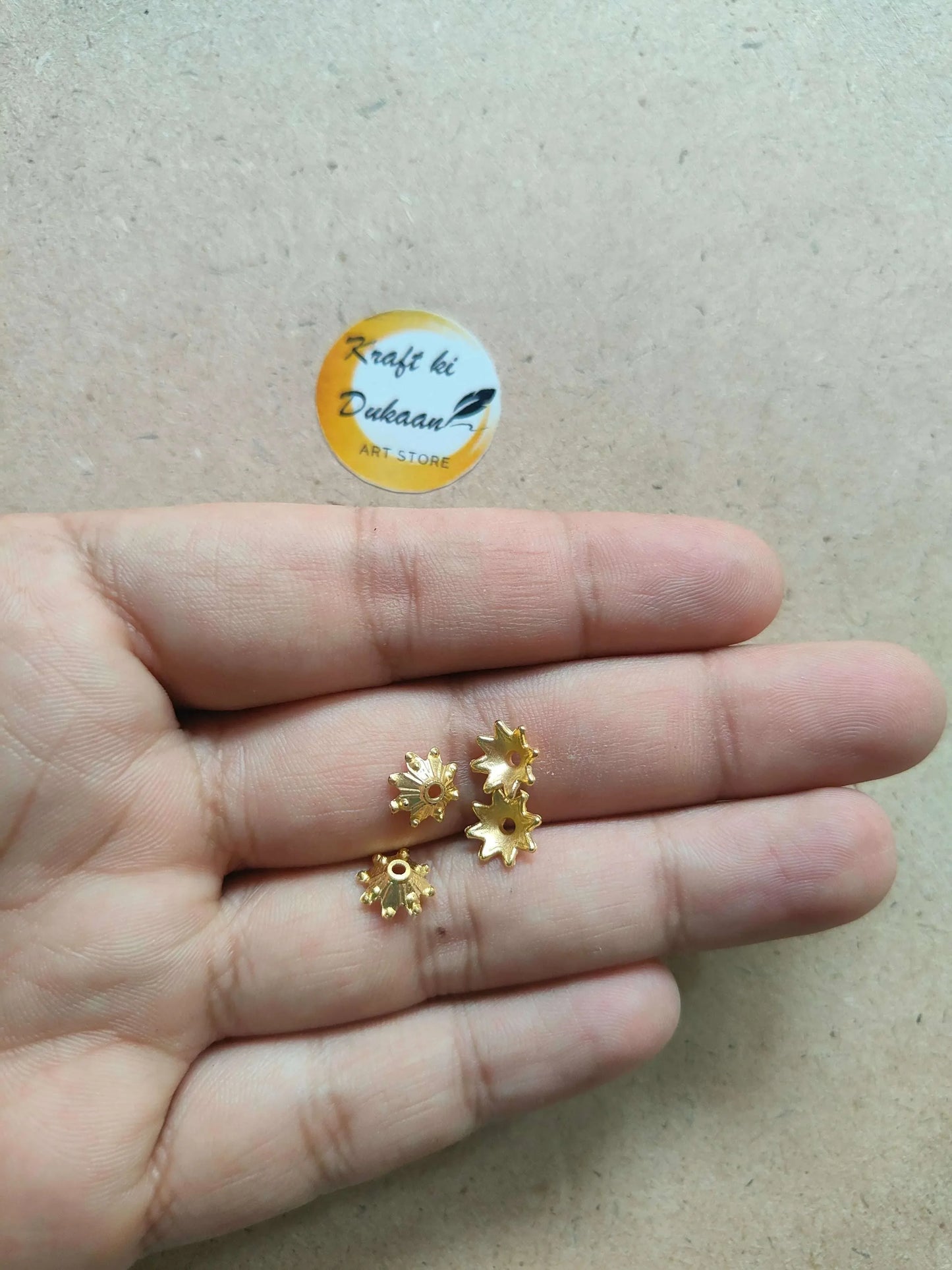 kraft-ki-dukaan-golden-flower-beads-for-crafts-in-hand